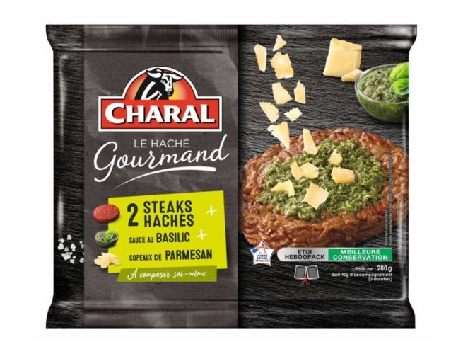 Charal steak chopped up basil sauce and parmesan shavings